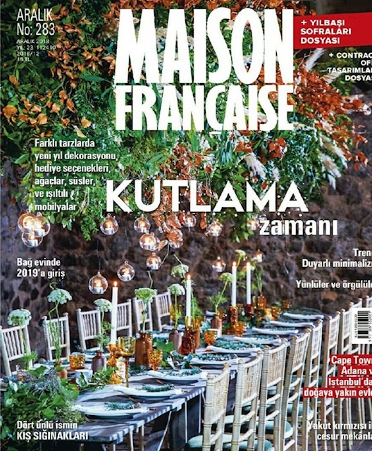 Dhoku luxury rugs featured in Maison Française magazine showcasing festive interior design
