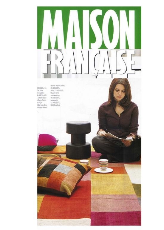 Dhoku luxury rugs featured in Maison Française showcasing interior styling