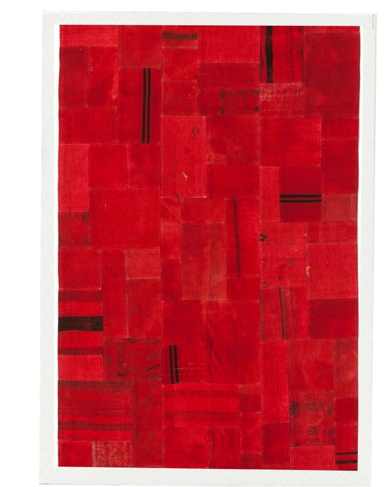 A vibrant vintage textile rug reimagined through patchwork construction, blending traditional weaving with a contemporary color expression. Perfect for adding depth and character to modern interiors.